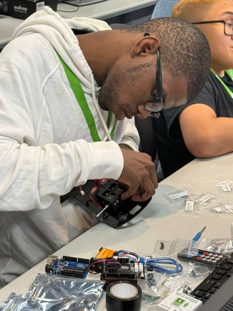 a student works on a robotics project